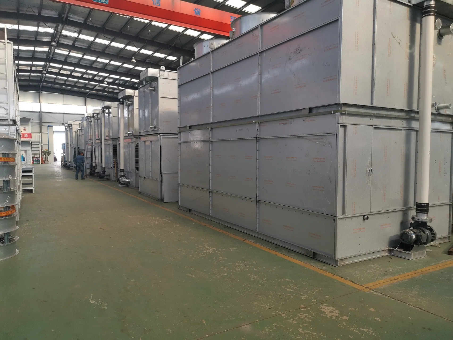 Factory floor with large closed cooling towers