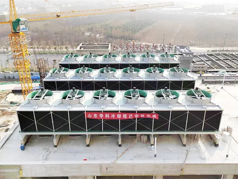 Rows of cross-flow FRP cooling towers on a building roof