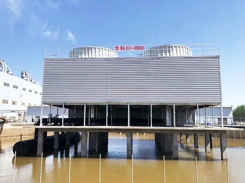 Large cooling tower built over a water basin